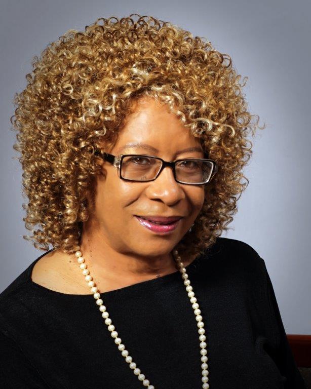 Paula Boger, Commissioner.